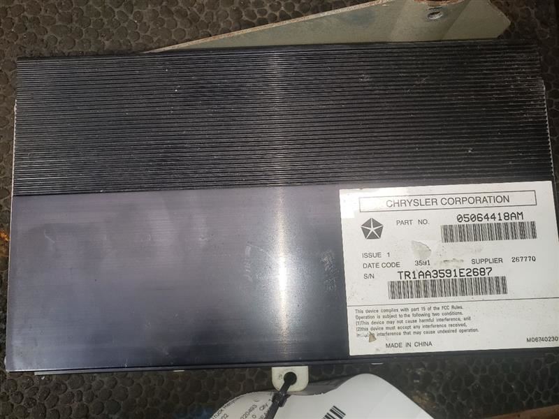 2012 DODGE RAM2500 RADIO AMPLIFIER. PART NUMBER 05064418AM