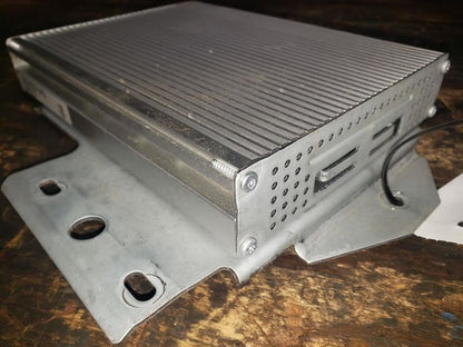 2005 RAM3500 RADIO AMPLIFIER. PART NUMBER 56046001AG